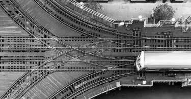 Aerial view of train at divergent tracks
