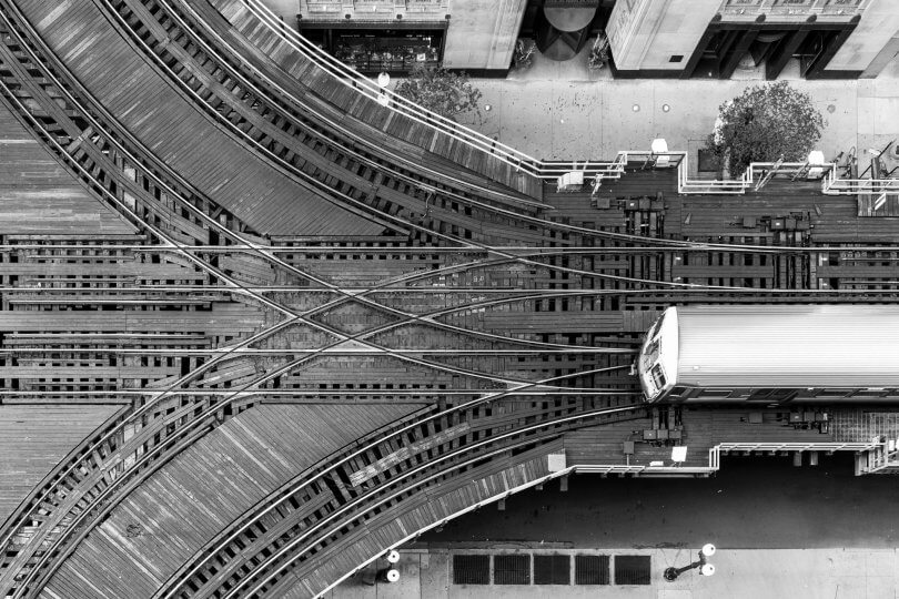 Aerial view of train at divergent tracks